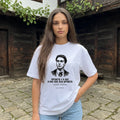 Жена с бяла oversized тениска Левски в двора на възрожденска къща в Жеравна noDRAMA